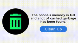 Screenshot of a scareware ad displaying a fake system alert reading "The phone's memory is full and a lot of cached garbage has been found" with a Clean Up button